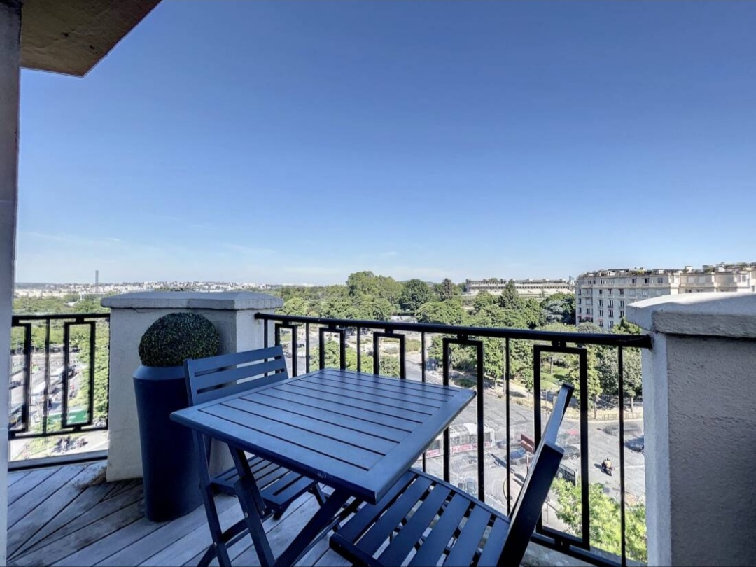 Private terrace of the Eiffel View Penthouse overlooking western Paris