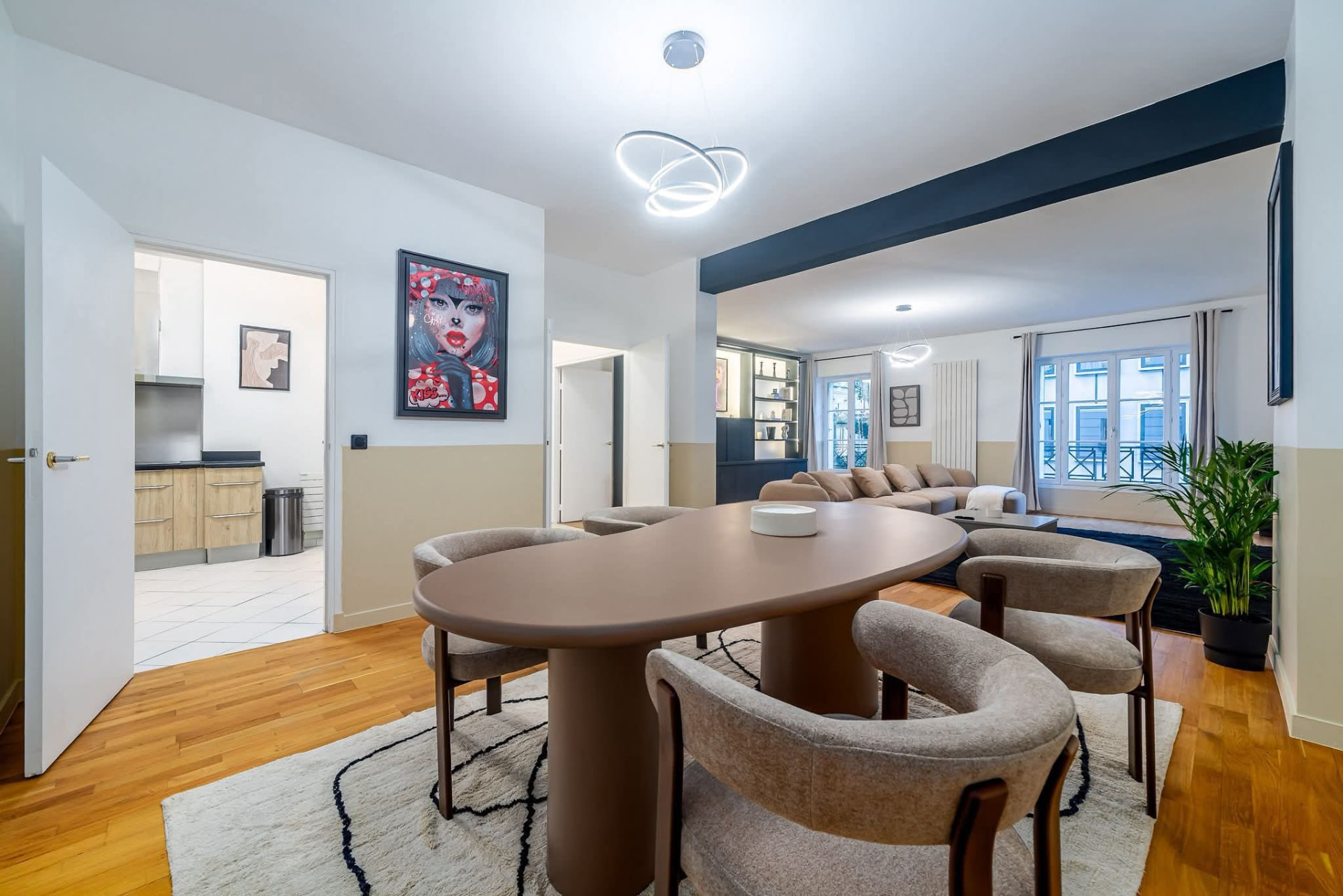 Spacious dining area with oval table seating six — Paris 7e, Paris, France